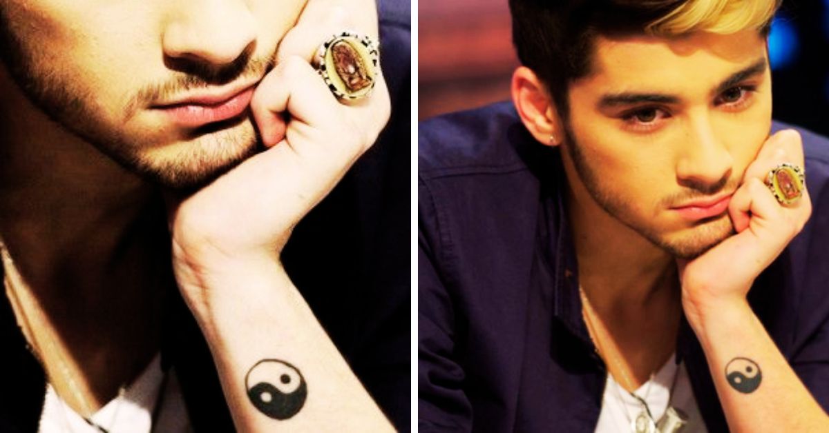 A Yin and Yang tattooed on his arm