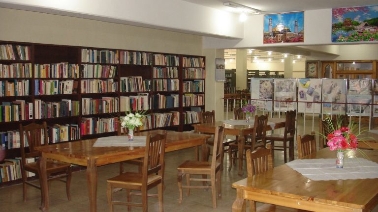 Reading tables and bookshelves inside the Kabul University Central Library