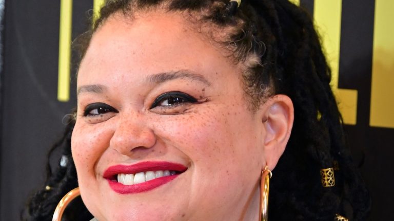 The Circle host Michelle Buteau smiling at a Broadway opening night