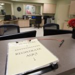 Sign-in desk in a rural community health center waiting room