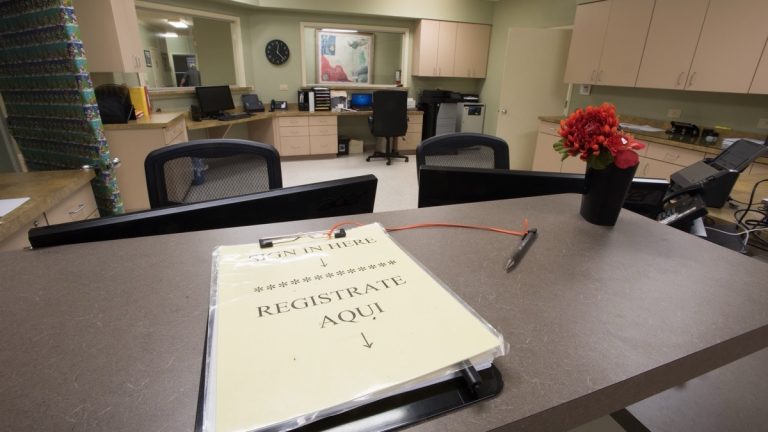 Sign-in desk in a rural community health center waiting room